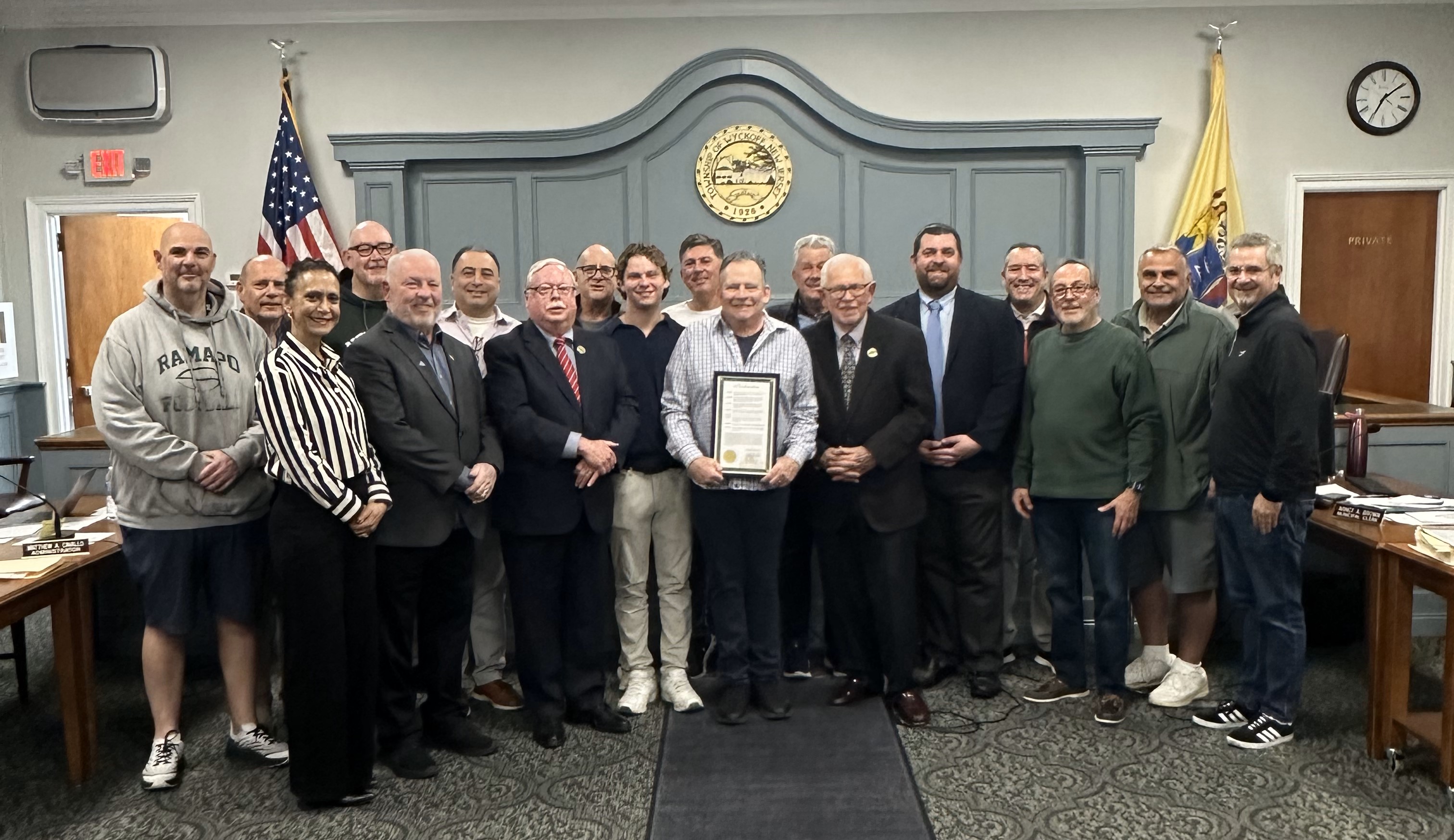 Howard Felixbrod with the Township Committee and his friends and family.